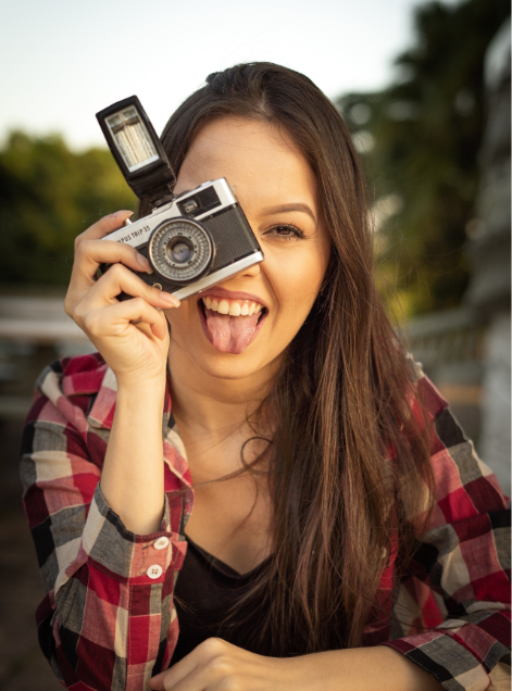 Woman Holding Camera